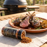 Middle Kingdom Lamb Lord 135g lamb seasoning — grilled lamb cutlets with herby crusts and blushing pink centres on a terracotta platter