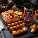 Middle Kingdom Pork Priest 170g pork seasoning — roast pork belly sliced into fingers with golden blistered crackling on dark slate