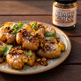 Nomad Chilli Co Salsa Macha chilli oil — crispy smashed potatoes topped with crunchy chilli oil