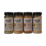 Outlaw Barbecue four pack BBQ rub bundle 1.05kg — Lawless, Bushranger, Stockman CRUST and Gold Rush shakers on a transparent background