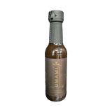 Rum and Que Umami Port & Black Garlic finishing sauce 150ml, front of bottle on transparent background