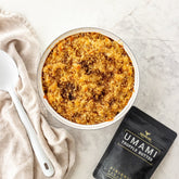 Rum and Que Umami Truffle Butter finishing seasoning — baked crumbed pasta dish with the pouch alongside