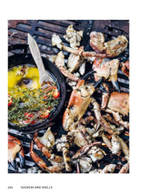 Scorched by Genevieve Taylor hardback cookbook — grilled crab legs with Scotch bonnet and thyme butter