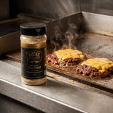 Smoky Pastures Top Shelf rub — seasoned smash burgers on a flat-top griddle