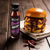 TAIPAN BBQ Bubblegum ultra hot 7 pot chilli BBQ sauce 250ml — beauty shot, loaded burger dripping with sauce