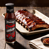 TAIPAN BBQ Carolina ultra hot Carolina Reaper BBQ sauce 250ml — beauty shot, glazed ribs with glossy lacquer