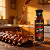 TAIPAN BBQ Competition Glaze mild sweet sticky BBQ glaze 250ml — action shot, sticky glaze dripping over ribs