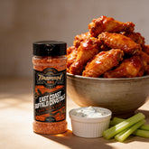 TAIPAN BBQ East Coast Buffalo Crystals buffalo wing seasoning 150g — beauty shot, glossy tossed buffalo wings with blue cheese dip