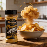TAIPAN BBQ Kartoffen potato & chip sprinkle 175g — action shot, seasoning explosion freeze-frame over hot chips