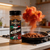 TAIPAN BBQ Mexicana taco seasoning 175g — action shot, seasoning explosion freeze-frame over sizzling taco mince