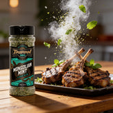 TAIPAN BBQ Mongolian Mint lamb BBQ rub 125g — action shot, herby mint rub explosion freeze-frame over grilled lamb chops