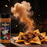 TAIPAN BBQ Outback Fiesta Oz-Mex seasoning 125g — action shot, seasoning cloud freeze-frame over beef nachos