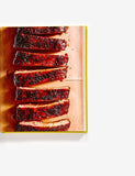 The Austin Cookbook by Paula Forbes hardback cookbook — interior page of sliced smoked pork ribs