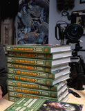 The MeatEater Outdoor Cookbook by Steven Rinella hardback cookbook — author Steven Rinella holding the book