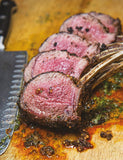 The Meathead Method by Meathead Goldwyn hardback cookbook — interior page of double-wide lamb rib chops with board sauce