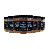 Uncle Mungo's The Lot 8-pack rub and seasoning bundle — front of shakers on transparent background