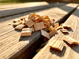 Western BBQ Products Apple Smoking Wood Chips lifestyle photo — close-up beauty shot of raw apple wood chips