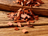 Western BBQ Products Cherry Smoking Wood Chips lifestyle photo — close-up beauty shot of raw cherry wood chips