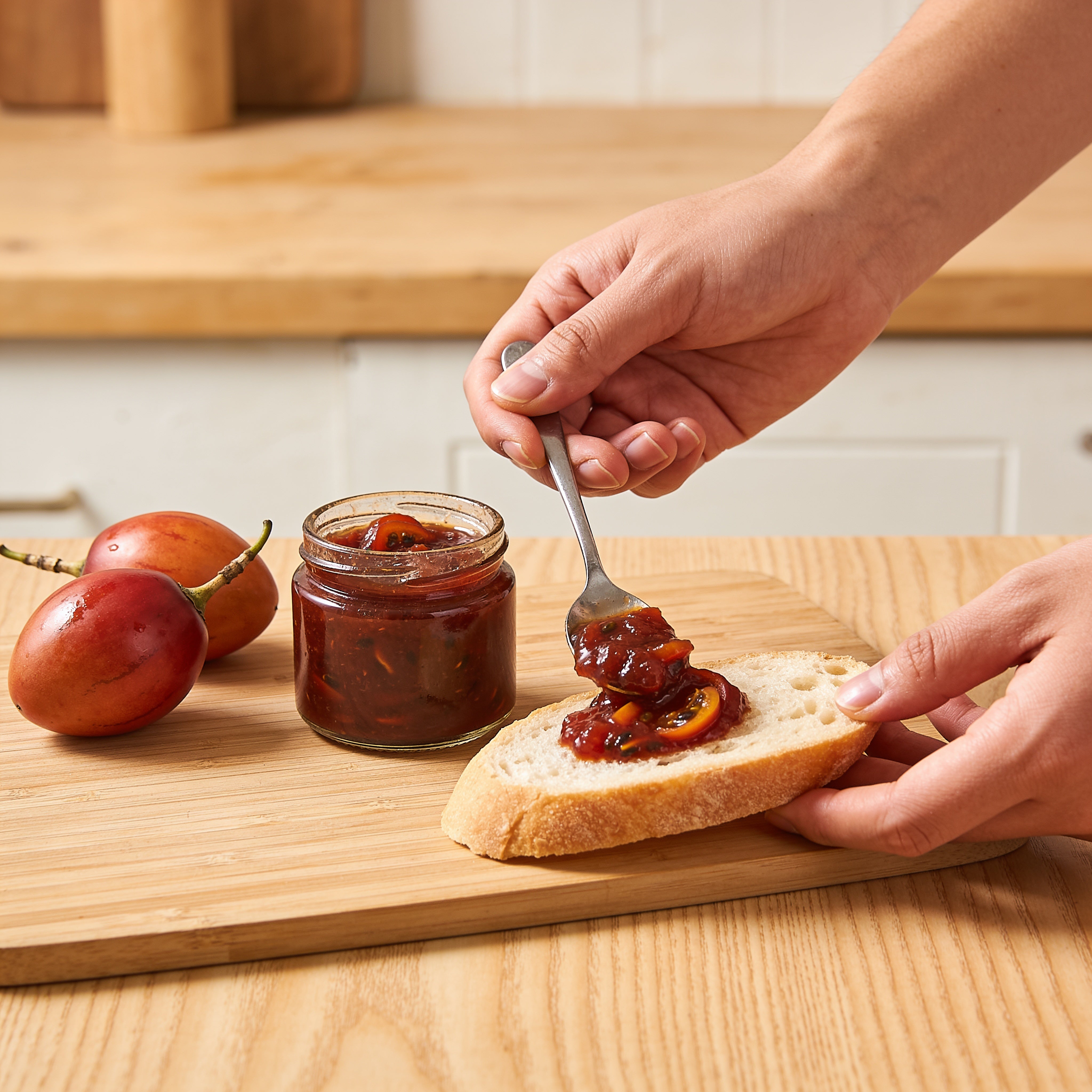 Tamco Tamarillo Relish spread on fresh bread