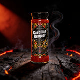 Cobra Chilli Carolina Reaper Chilli Mash Extreme 150ml Chilli Mash — styled hero shot with dark gothic snake-and-fire brand styling