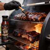 Cobra Chilli Black Magic BBQ Sauce 250ml BBQ Sauce — BBQ sauce glazed onto smoked ribs and burnt ends