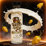 Cobra Chilli White Magic BBQ Sauce Medium 250ml BBQ Sauce — medium heat action shot with creamy sauce splash and Scotch Bonnet chillies
