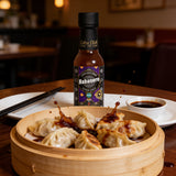 Cobra Chilli Habanero Magic Sauce Medium 150ml Condiment — sauce splashed over dumplings and pot stickers