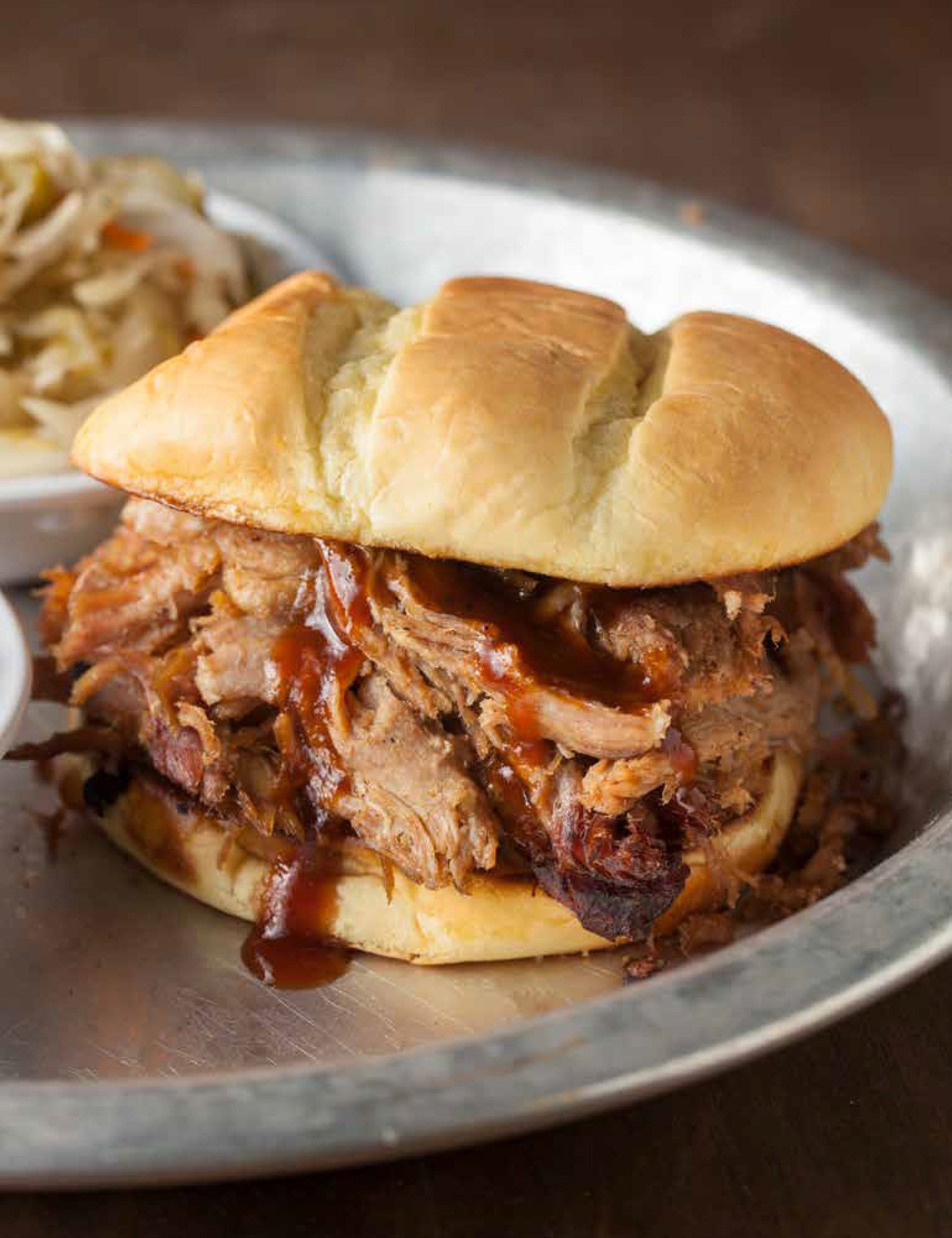 12 Bones Smokehouse by Bryan & Angela King hardback cookbook — interior page of the oven-roasted pulled pork butt