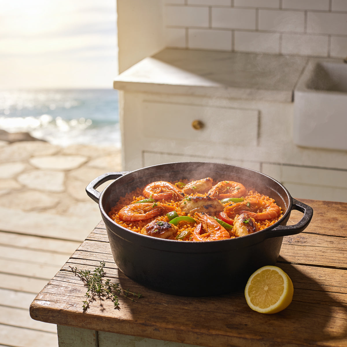 Overhead pot of Creole jambalaya with prawns, chicken and capsicum