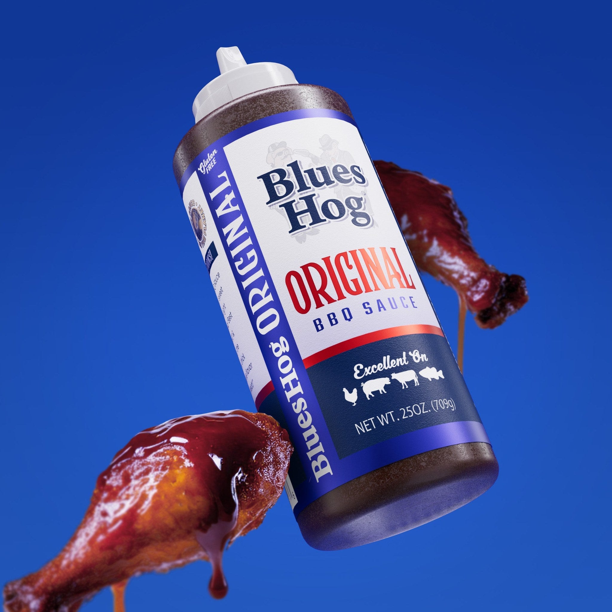 Blues Hog Original BBQ Sauce 709g — chicken drumsticks glazed with sauce, lifestyle shot