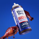 Blues Hog Original BBQ Sauce 709g — chicken drumsticks glazed with sauce, lifestyle shot