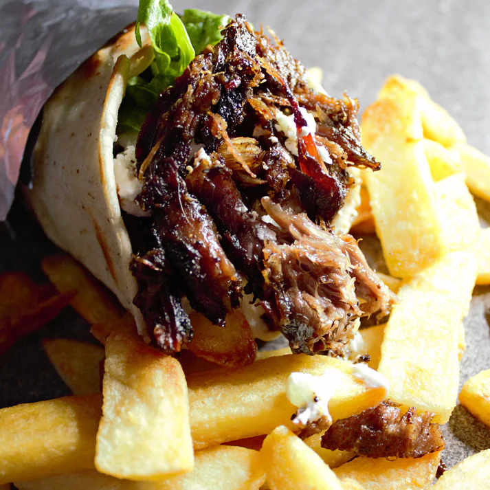 Greek-style gyro wrap loaded with crispy fries