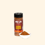 BBQ Lab Island Smoke rub in a small bowl beside the jar