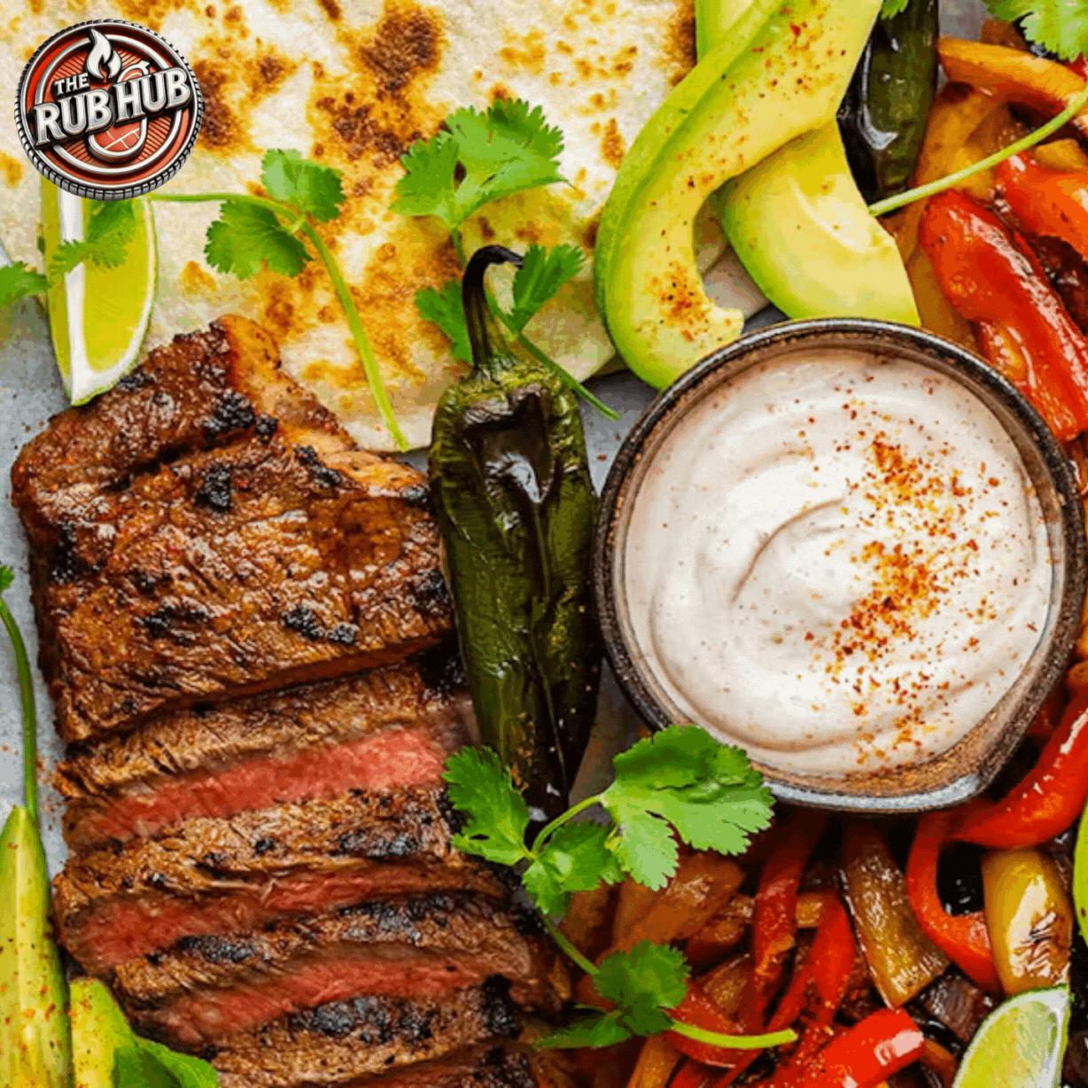 Grilled steak fajita platter with lime, avocado and jalapeño
