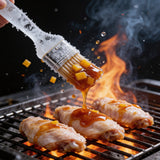 Atomic Chicken Honey Mango BBQ Sauce 250ml — sauce being brushed onto wings on a flaming grill, frozen mid-motion