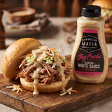 Barbecue Mafia Big Paulie Alabama White Sauce — creamy white sauce drizzled over an open pulled-pork slider