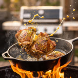 Barbecue Mafia Double Butter Bang BBQ Rub — chicken thighs tossed in glossy garlic butter over flames