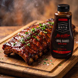 Barbecue Mafia Mobster BBQ Sauce — pork ribs lacquered in glossy dark BBQ sauce