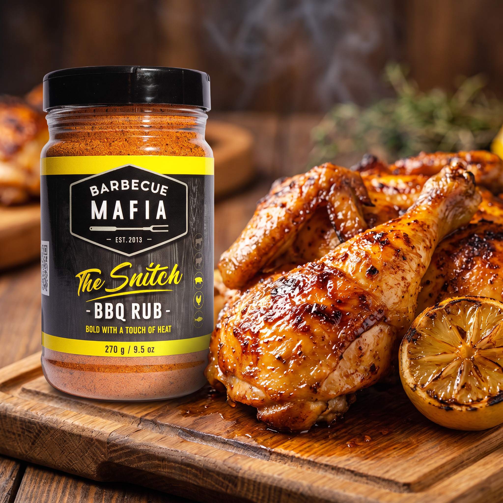 Barbecue Mafia The Snitch BBQ Rub — golden crisp-skinned grilled chicken pieces beside the pack
