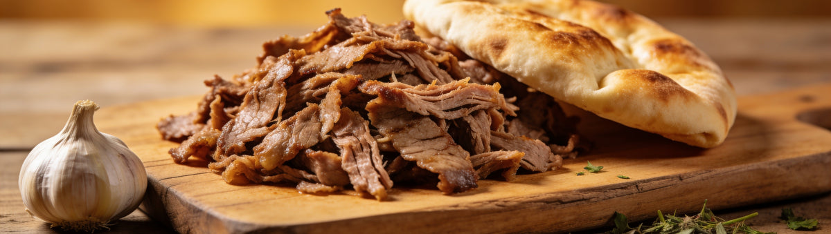 Butchers Axe Gyros Rotisserie Seasoning — cinematic banner, seasoning composited into a lifestyle BBQ scene