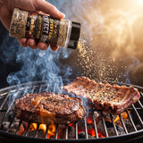 Big GCs Godfather Magic rub shaken onto steak and ribs on the grill