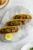 ChamCham Hot Bae hot sauce on salmon tacos