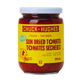 Chuck Hughes Mild Sun-Dried Tomato Spread 375ml tomato spread — front of jar on transparent background
