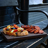 Chuck Hughes Spicy Antipasto 375ml antipasto condiment — grilled sourdough with spicy antipasto and chargrilled chorizo on a dark board