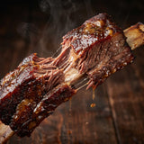 Coast n Smoke T-Rub Umami seasoning — a beef short rib pulled to show tender juicy meat and dark bark
