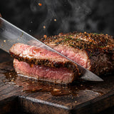 Coast n Smoke Zeally seasoning — slicing a seared steak to reveal a juicy rosy-pink medium interior