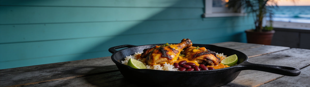 Jerk chicken with rice and beans glazed in Cobra Chilli Blazing Saddles Chilli Sauce in a cast-iron skillet