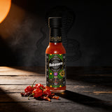 Cobra Chilli Habanero Pepper Sauce Hot 150ml hot sauce — styled hero shot in Cobra Chilli's gothic-western brand setting