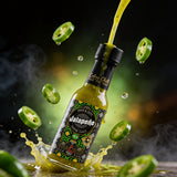 Cobra Chilli Jalapeño Pepper Sauce Mild 150ml hot sauce — dynamic action shot with jalapeño slices
