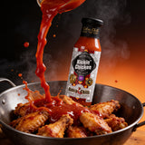 Cobra Chilli Kickin' Chicken Wing Sauce Hot 250ml hot sauce — dynamic action shot wing-tossing